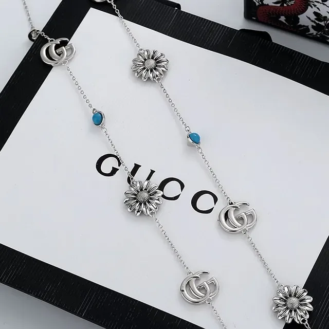 Gucci Multi-Charm Daisy and GG Logo Silver-Tone Necklace 2