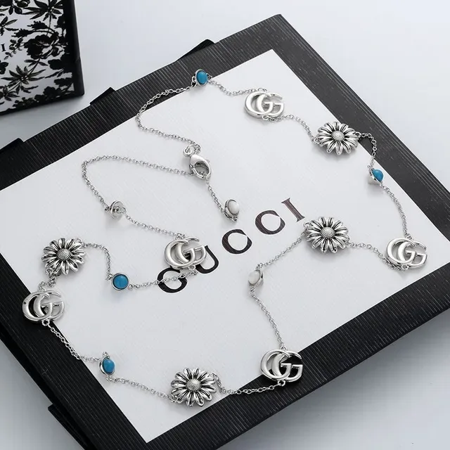 Gucci Multi-Charm Daisy and GG Logo Silver-Tone Necklace 4