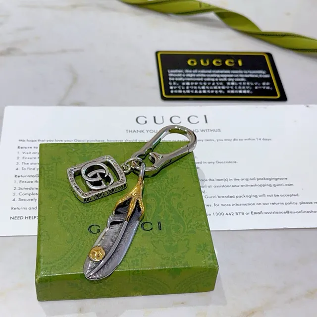 Gucci Silver Gold Metallic Two-Tone GG Logo Charm Bracelet 2