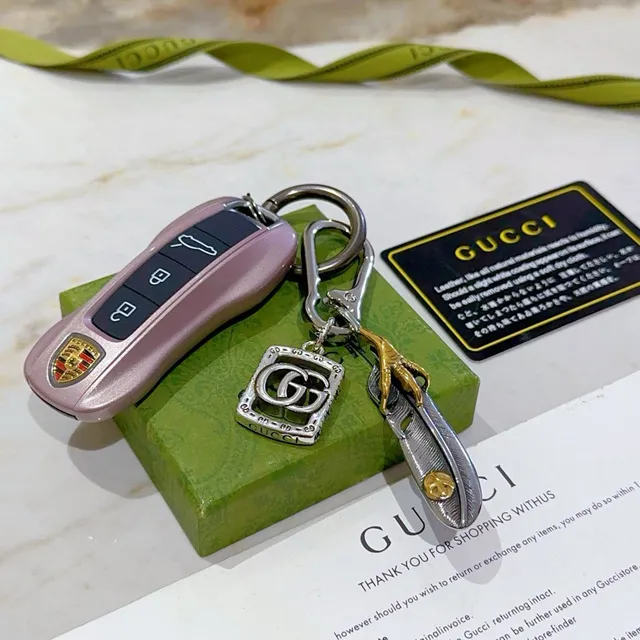 Gucci Silver Gold Metallic Two-Tone GG Logo Charm Bracelet 3