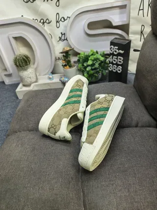 Gucci Tennis 1977 GG Monogram قماش أخضر ويب سترايب حذاء ستايل حياة 6