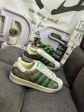 Gucci Tennis 1977 GG Monogram قماش أخضر ويب سترايب حذاء ستايل حياة 9