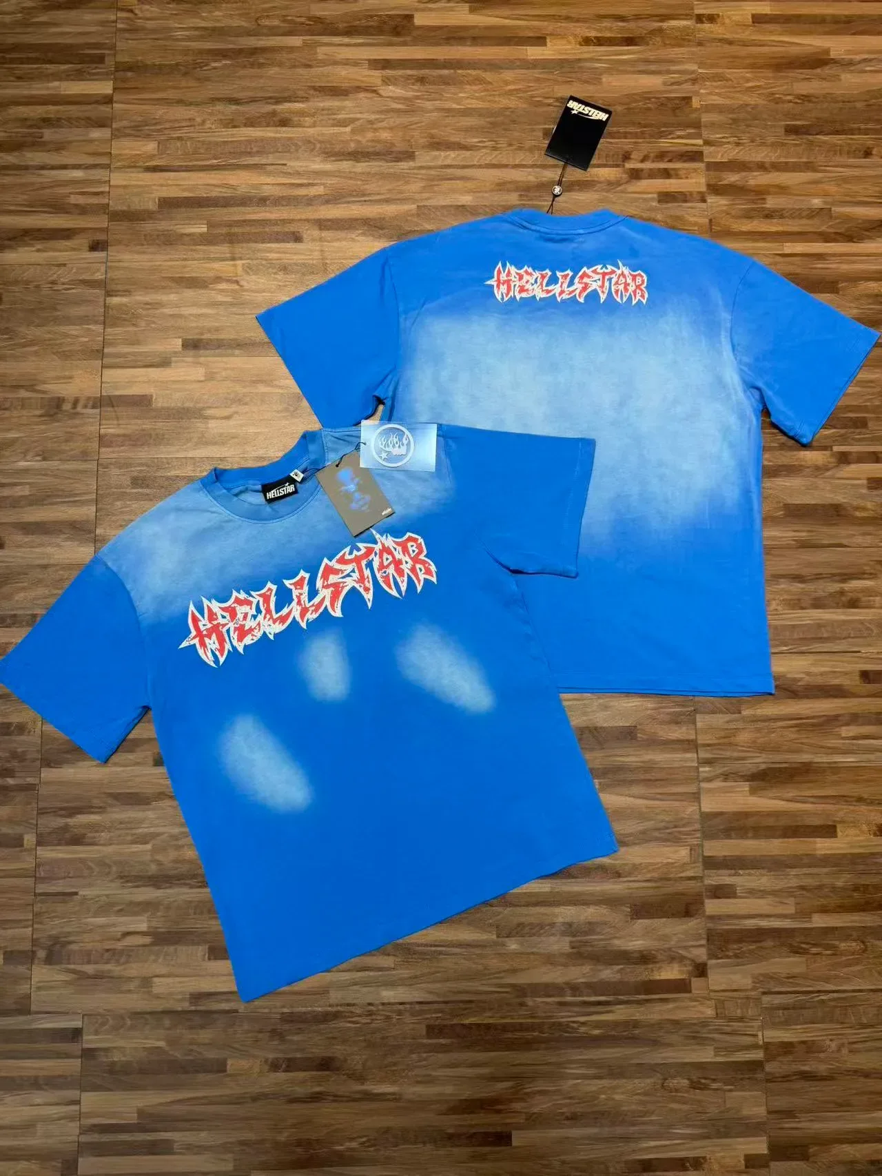 Camiseta oversized Hellstar con estampado gráfico de salpicaduras de lejía 9