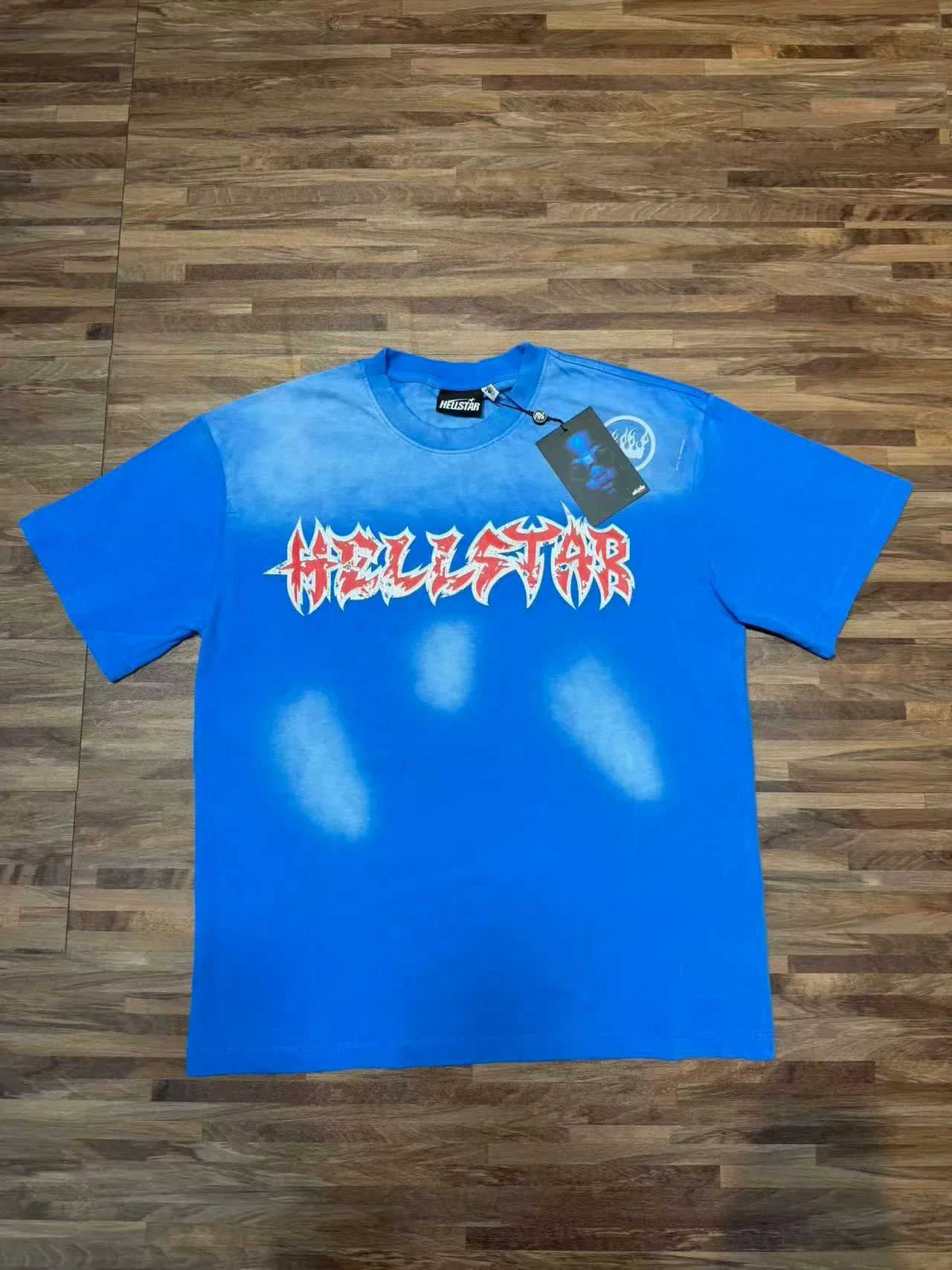 Camiseta oversized Hellstar con estampado gráfico de salpicaduras de lejía 10