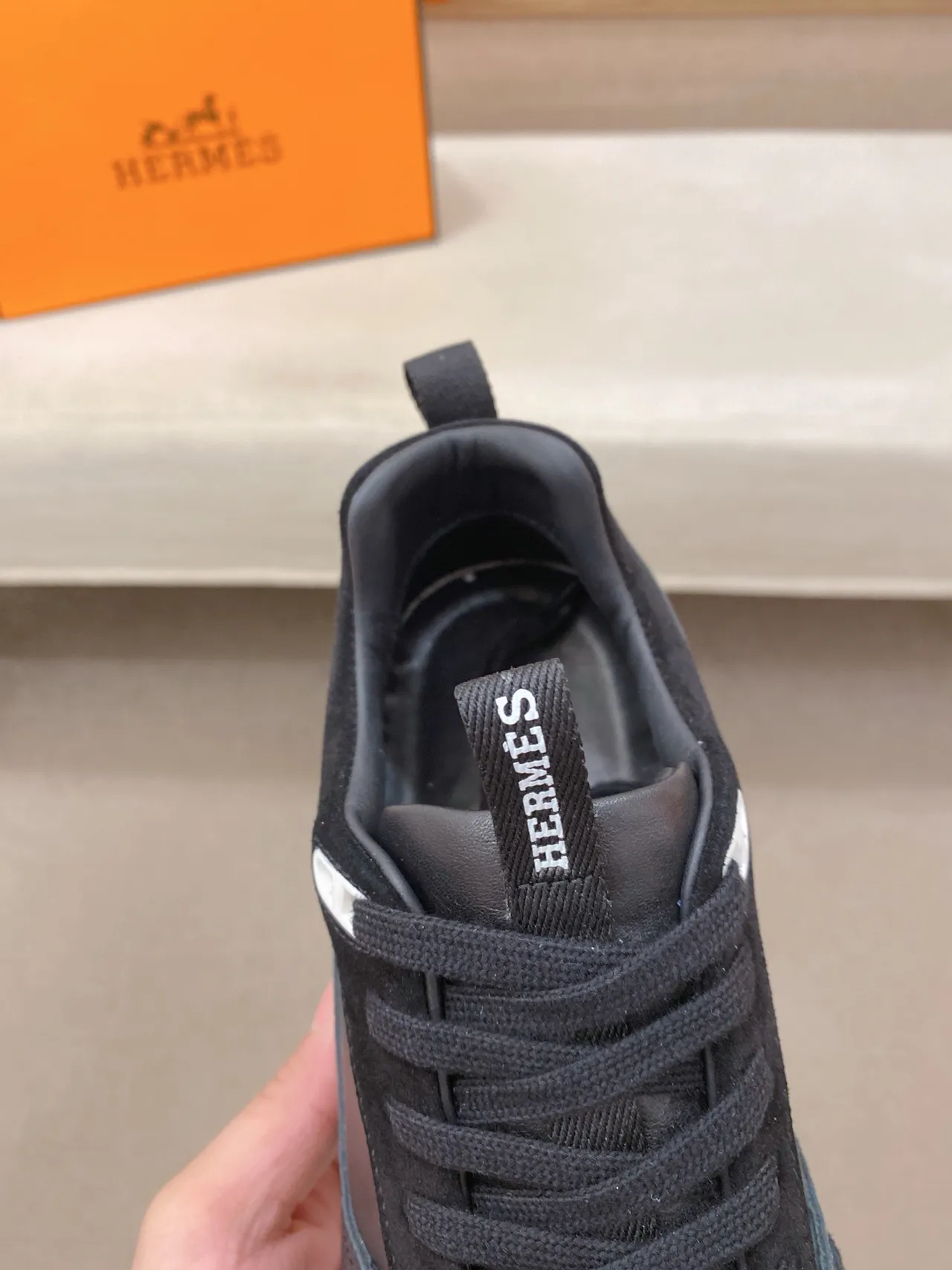 Hermès Black and White Lifestyle Sneaker 5