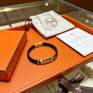 Hermès Black Gold Braided Leather Hardware Bracelet
