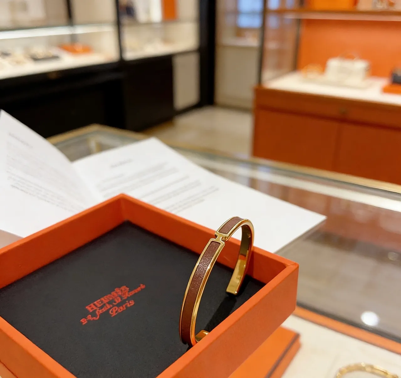 Hermès Clic H Brown Leather and Gold-Tone Open Cuff Bracelet 2