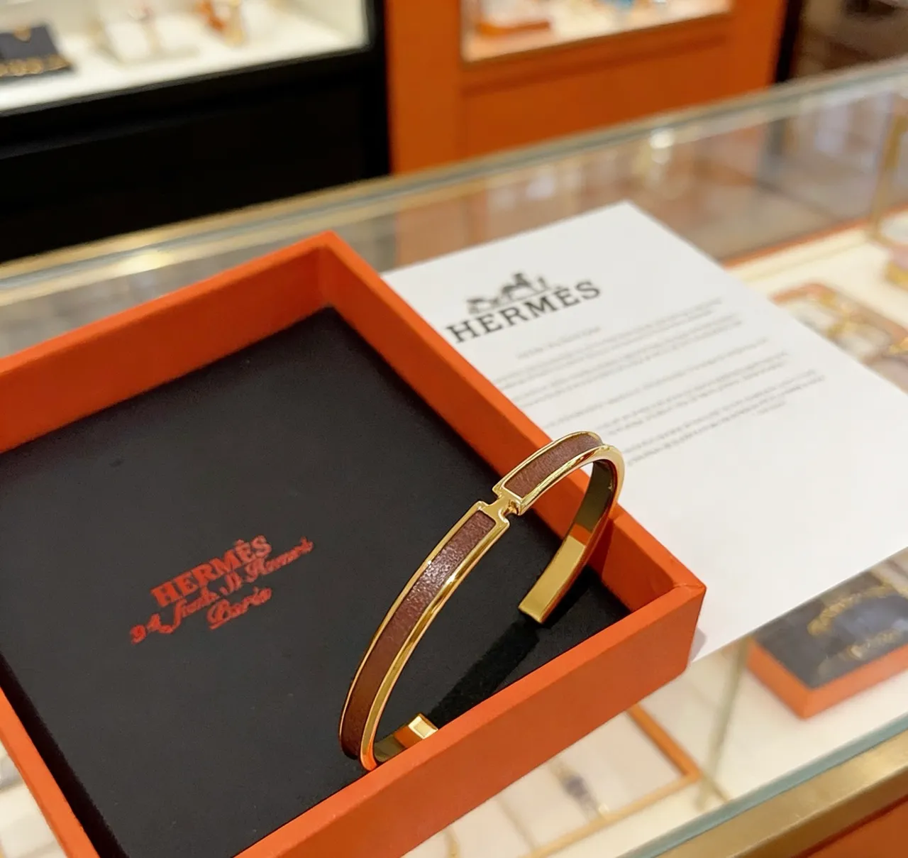 Hermès Clic H Brown Leather and Gold-Tone Open Cuff Bracelet 8