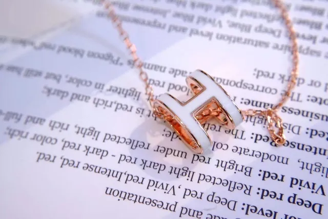 Hermès H Gold White Geometric Pendant Rose Metal Necklace 3