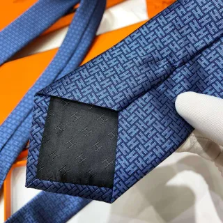 Hermès H Logo Blue Black Woven Silk Interlocking Monogram Pattern Necktie