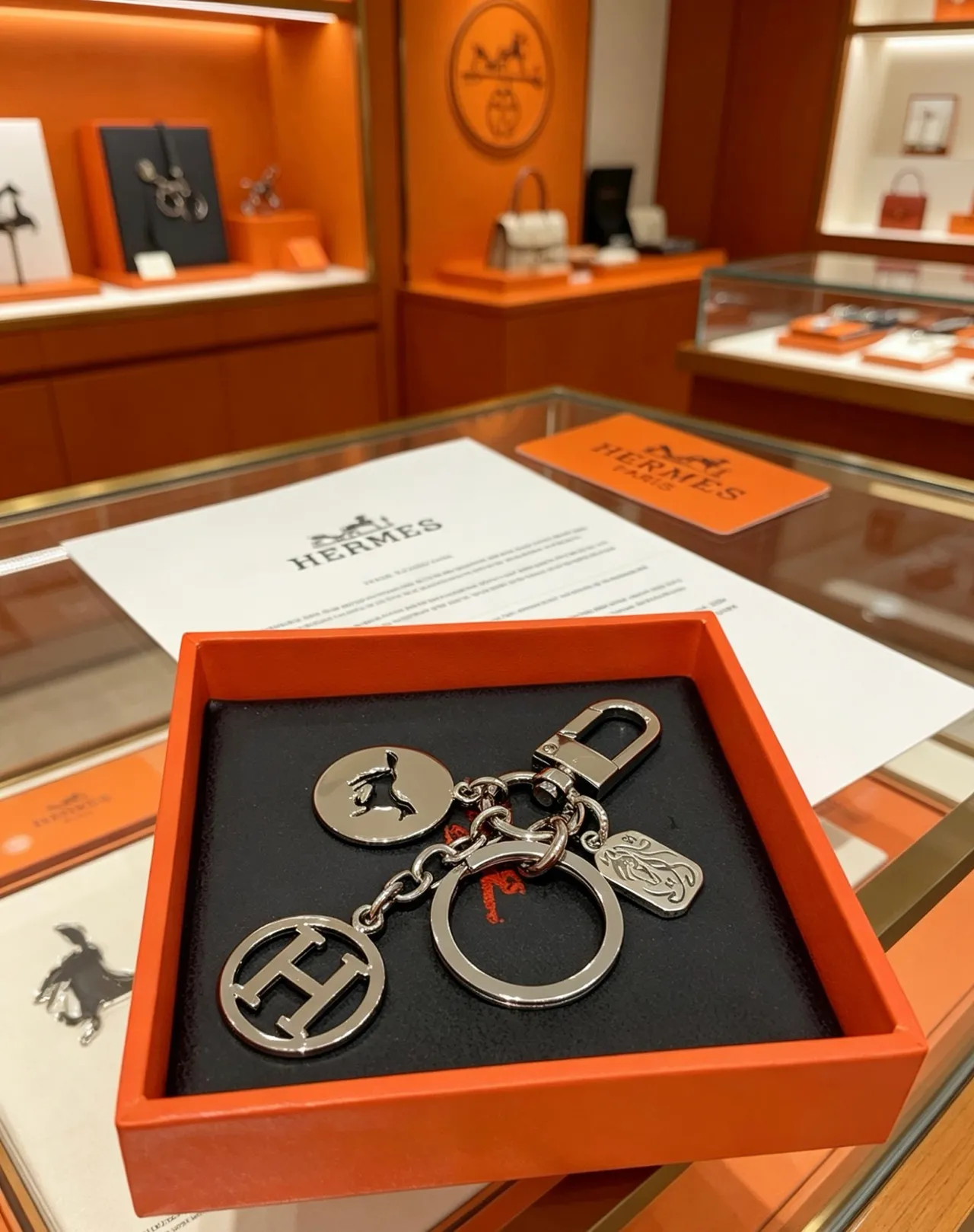 Hermès Multi-Charm Keychain Silver Black Polished Metal Assembly Bracelet 3