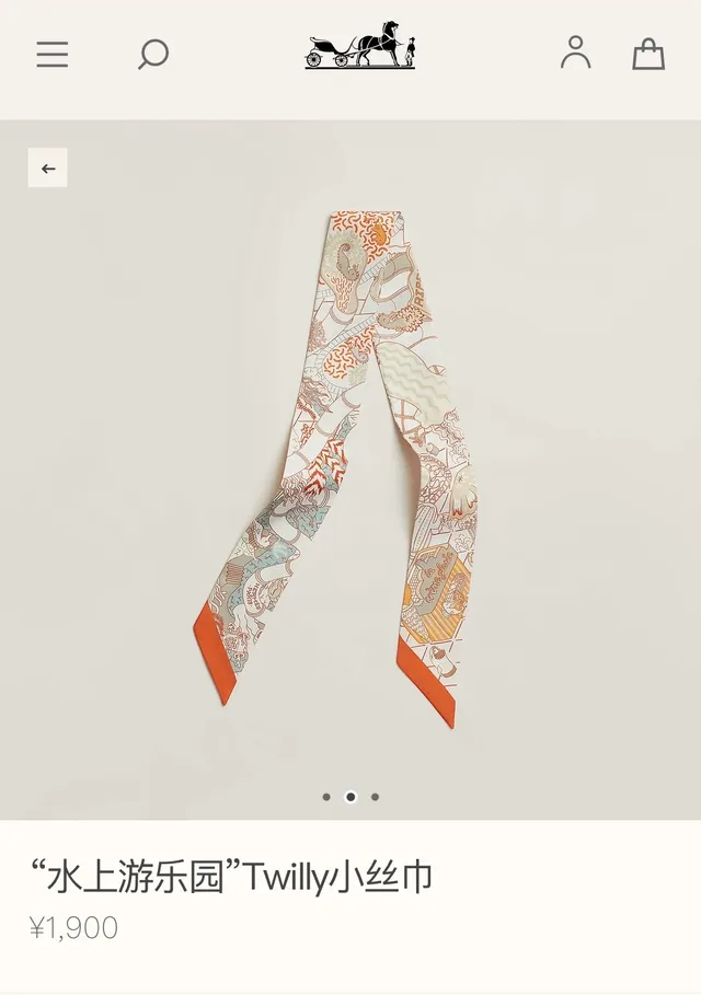 Hermès Printed Orange-Bordered Silk Scarf 2