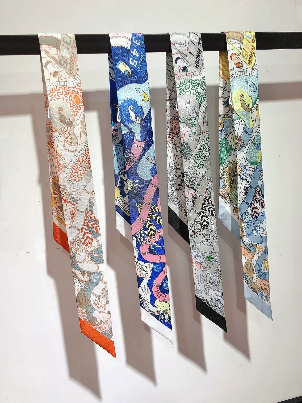 Hermès Printed Orange-Bordered Silk Scarf 4