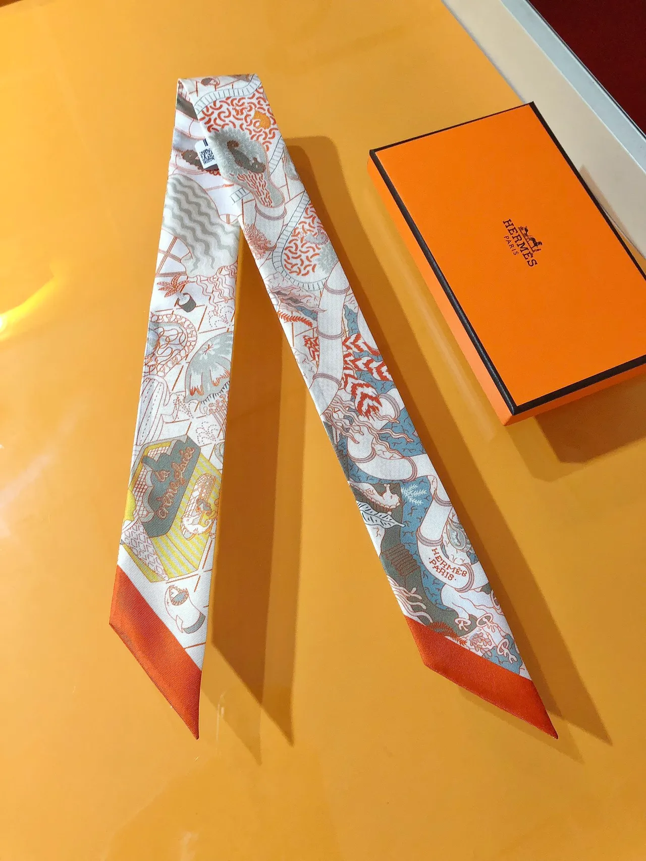 Hermès Printed Orange-Bordered Silk Scarf 5