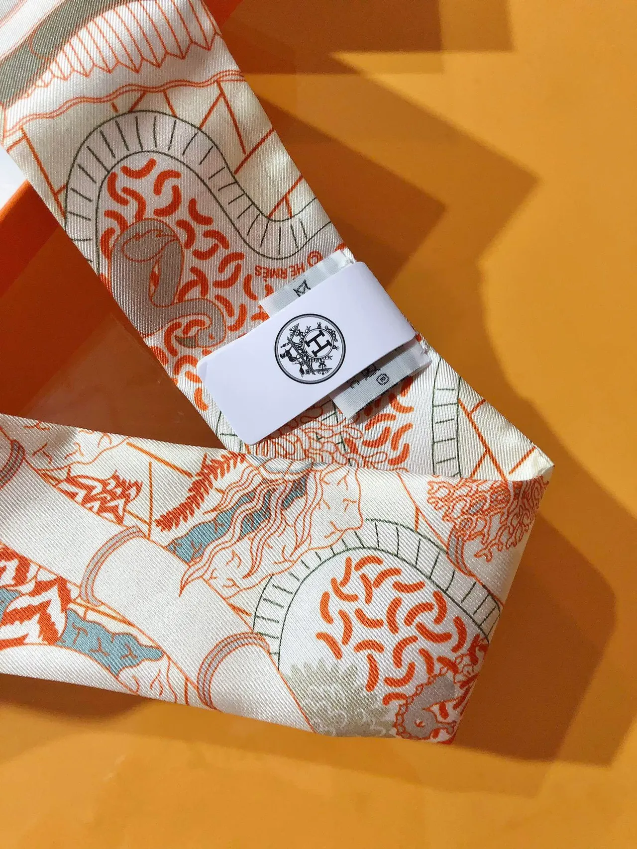 Hermès Printed Orange-Bordered Silk Scarf 7