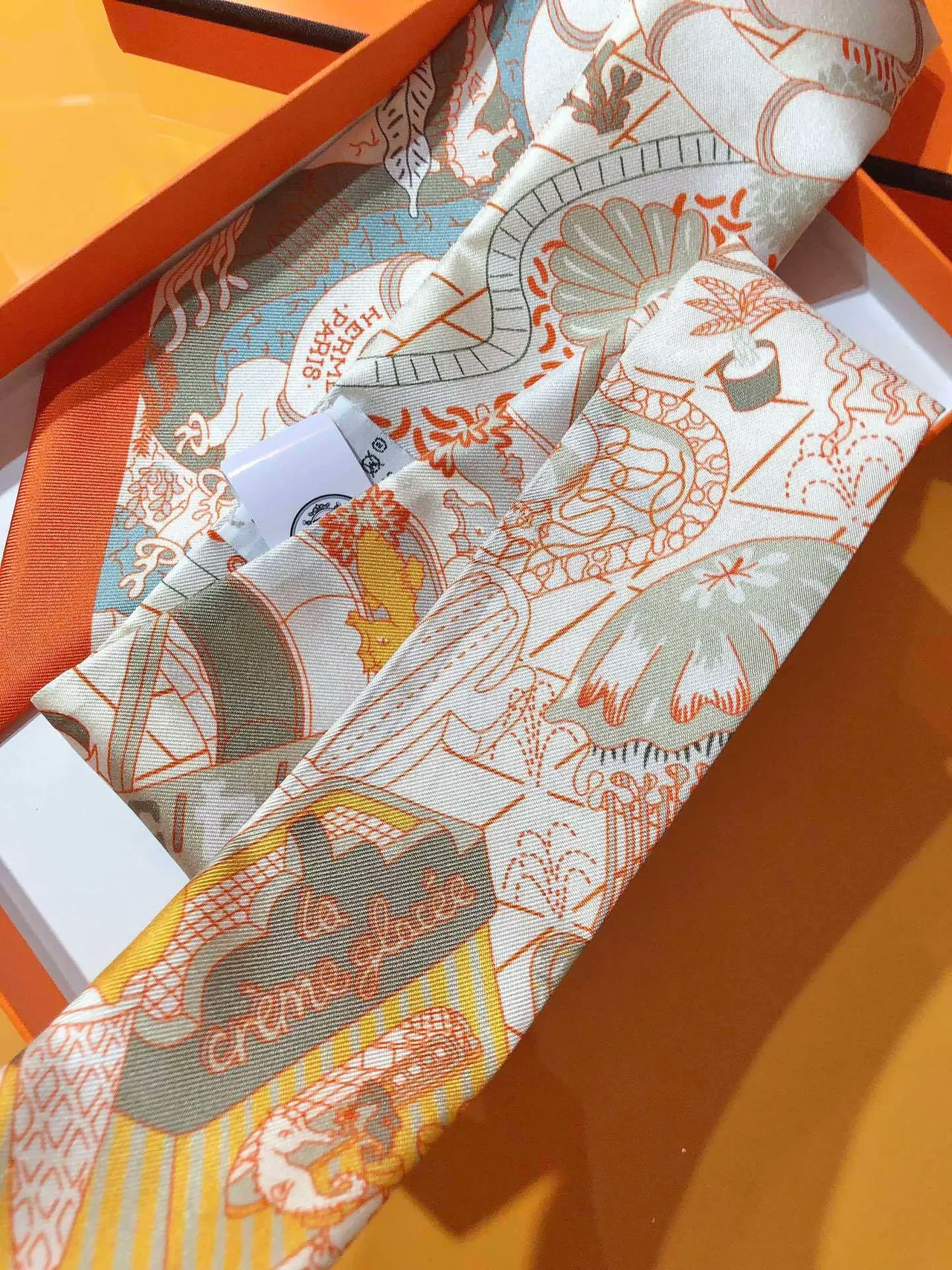 Hermès Printed Orange-Bordered Silk Scarf 9