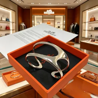 Hermès Silver Polished Asymmetrical Openwork Cuff Bracelet