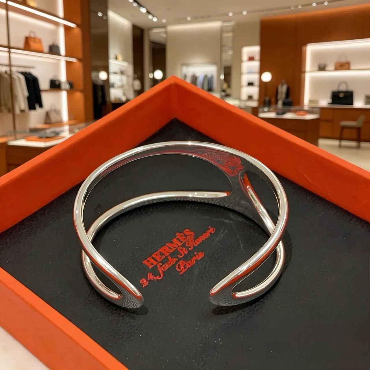 Hermès Silver Polished Asymmetrical Openwork Cuff Bracelet 2