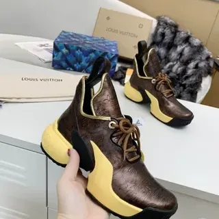 Louis Vuitton Tênis chunky de couro metálico com monograma, sola esculpida, marrom amarelo