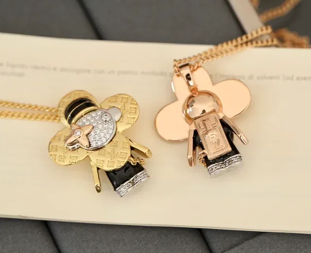Louis Vuitton Gold Black Monogram-Engraved Pavé-Crystal Face Necklace 7