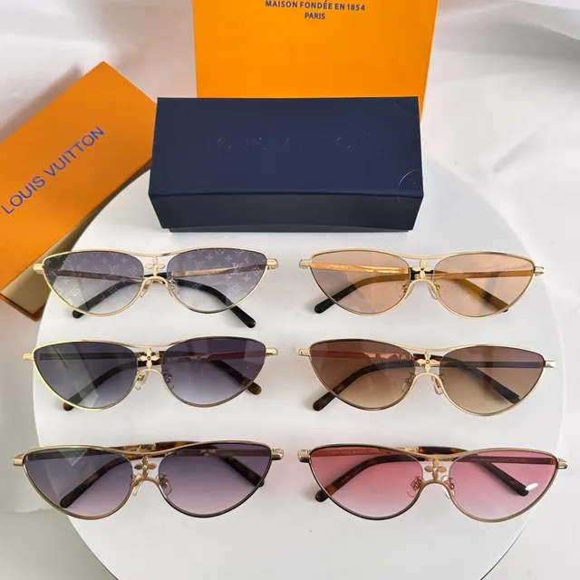 Louis Vuitton dorées bleues silhouette chat-oeil monogrammées lentilles lunettes de soleil 9