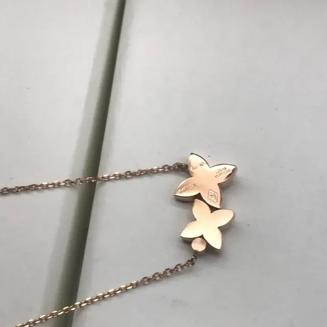 Louis Vuitton Gold LV Monogram Charm Necklace 4