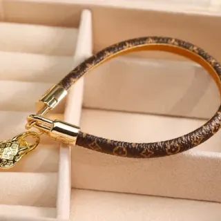 Louis Vuitton Lock It Monogram Brown Leather Gold-Tone Bracelet