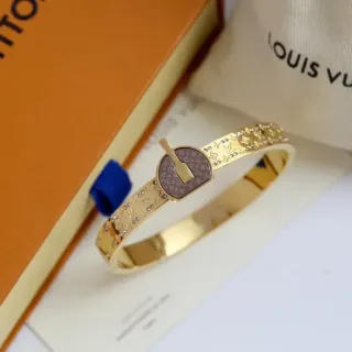 Louis Vuitton Lock It Monogram كريستال ذهبي النغمة سوارة