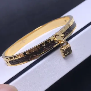 Louis Vuitton Lockit Monogram Entalhado Dourado Couro Inlay Pulseira