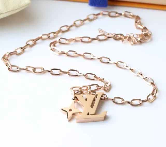 Louis Vuitton LV Monogram and Flower Charm Gold-Tone Chain Necklace 7