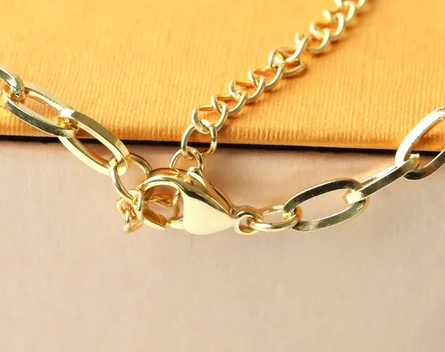 Louis Vuitton LV Monogram and Flower Charm Gold-Tone Chain Necklace 8