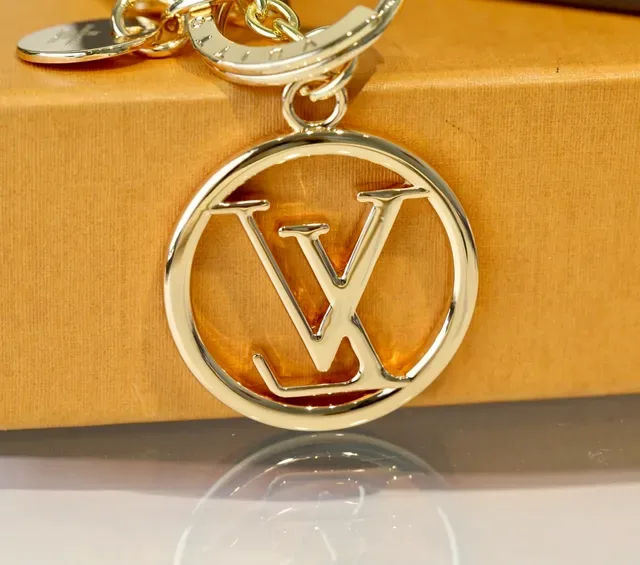 Louis Vuitton LV Monogram Keyholder Gold Brown Polished Metal Interlocking Bracelet 2