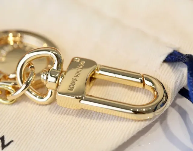 Louis Vuitton LV Monogram Keyholder Gold Brown Polished Metal Interlocking Bracelet 3