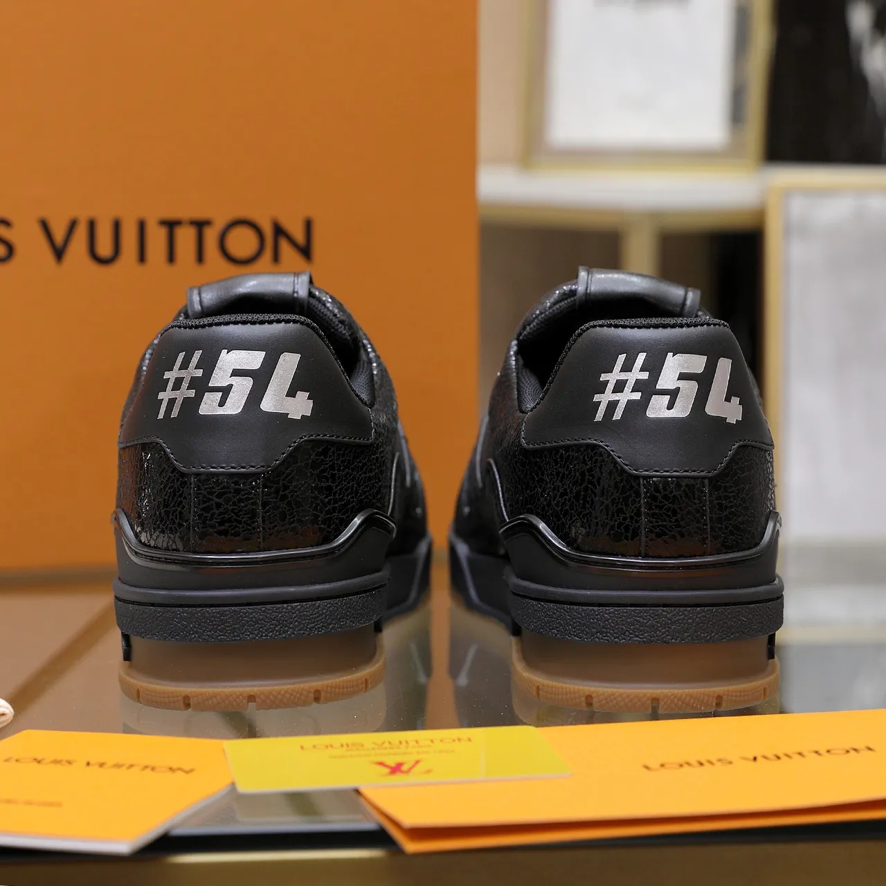 Louis Vuitton LV Trainer Black Brown Textured Cracked Leather Upper Metallic Plaque Hardware Lifestyle Sneakers 3