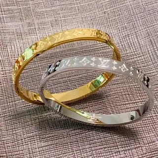 Louis Vuitton Monogram سوار ذهبي فضي منحوت صلب
