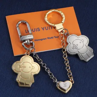 Louis Vuitton Monogram World Tour Gold Silver Oso en Forma de Trébol Motif LV Grabado Bracelet