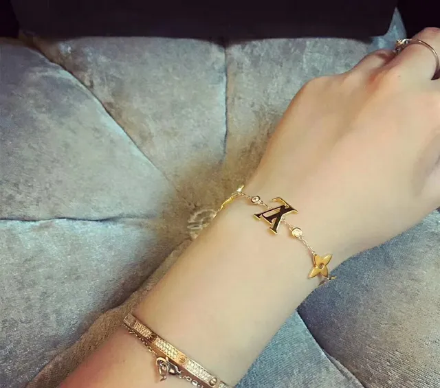 Louis Vuitton Multi-Icon Gold-Tone Chain Bracelet 9