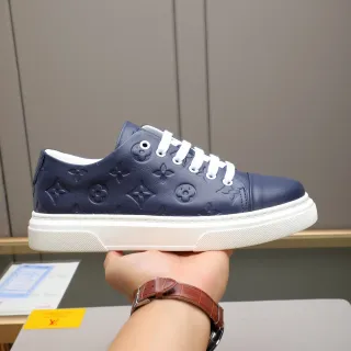 Louis Vuitton Zapatillas de lifestyle plataforma low-top de cuero con monograma embossed navy blanco