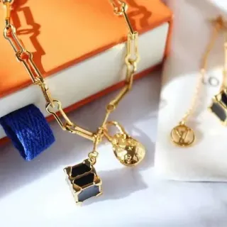 Louis Vuitton Petite Malle Gold-Tone Black Enamel Cube Charm Necklace