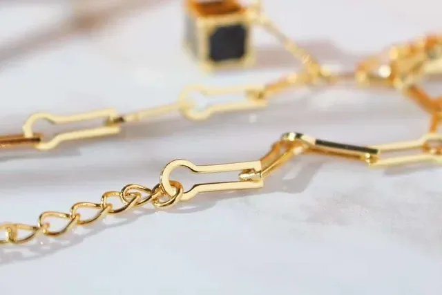 Louis Vuitton Petite Malle Gold-Tone Black Enamel Cube Charm Necklace 17