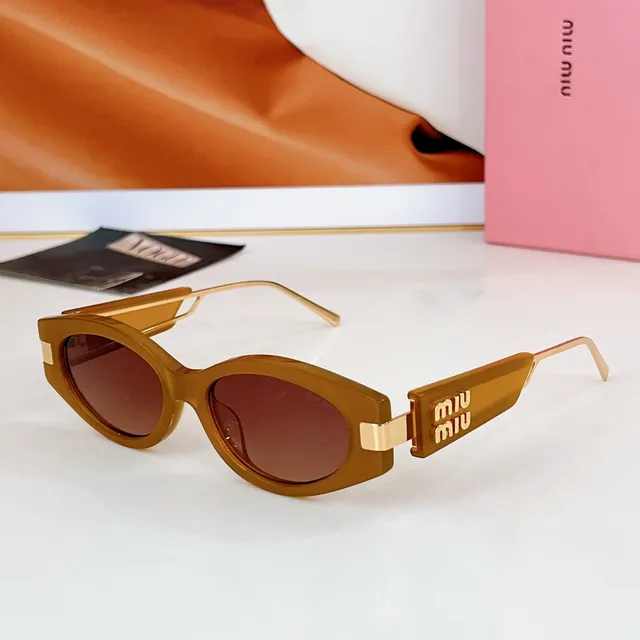 Miu Miu Gafas de sol marco rectangular-ovalado negro oro acetato grueso 8