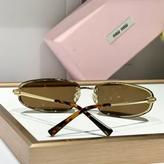 Miu Miu نظارات شمسية معدنية بلون ذهبي وصدفة السلاحف