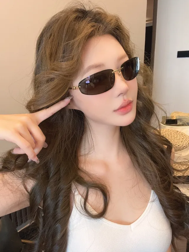 Miu Miu Lunettes de soleil en métal doré et écaille de tortue 2