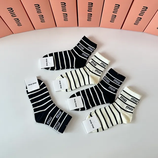 Miu Miu Striped Logo-Cuff Mid-Calf Socks 7