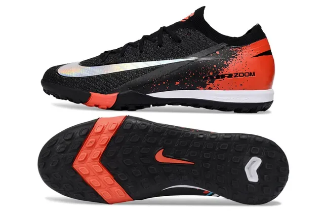 Nike Chaussures de football noir et orange avec upper en knit et semelle turf 5