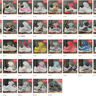 Nike Chaussures de course noires et oranges à bout bas, tige en maille et synthétique