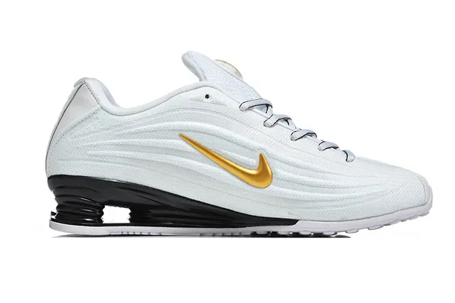 Nike White and Gold Swoosh Lifestyle Sneaker 2