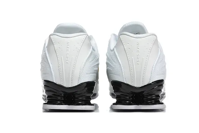 Nike White and Gold Swoosh Lifestyle Sneaker 4