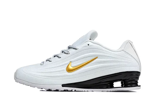 Nike White and Gold Swoosh Lifestyle Sneaker 6
