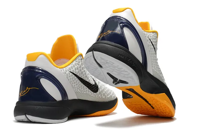 Nike Chaussures de Basketball Silhouette Low-Top Blanc Orange avec Upper Texturisé Honeycomb 2